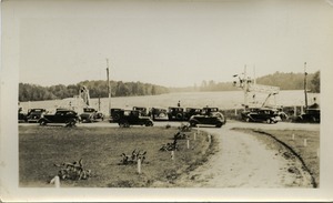 Lake Rohunta: view of automobiles parked alongside the lake, diving tower, and slides