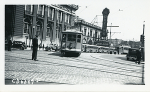 Streetcars in front of the Uptown Theater