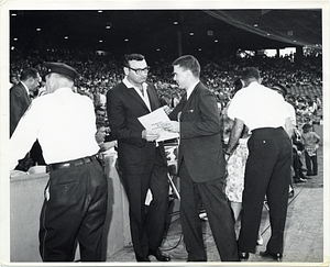 Two unidentified men at Fenway Park