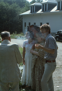 Arthur E. Rosenburg, Charmaine Masters, Ella Rosenburg, and Henry Art (left to right) at the Carriage House at beginning of the Moon Barn Raising at entrance to Hopkins Forest on 2 August 1975.