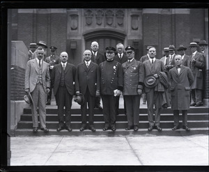 Group of distinguished men, including Gov. Frank G. Allen (3rd from left), Police Superintendent Michael H. Crowley (4th from left), Commissioner Foot, and Bearbre