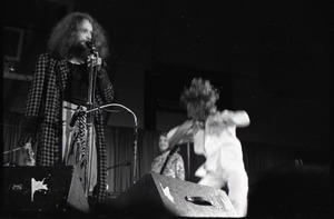 Jethro Tull in concert at the Springfield Civic Center: Ian Anderson (vocals) and John Evan jumping