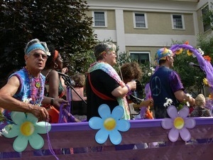 Parade marchers dressed as hippies : Provincetown Carnival parade