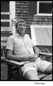 John Updike portrait seated