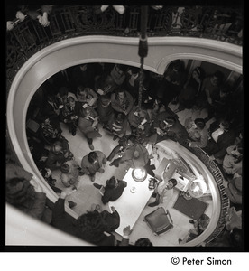 Antiwar protesters occupying University Hall, Harvard (?): looking down a stairway at occupying students and press