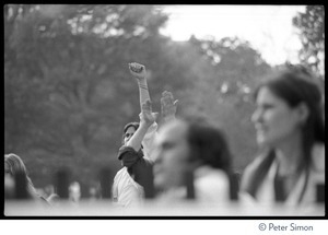 Audience member at the No Nukes concert and protest, raising a fist