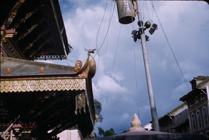 Corner of a small Hindu temple in Kathmandu near an electrical pole