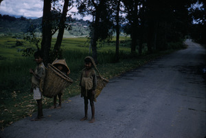 Village children with baskets