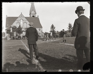 Kickoff to a football game near Old Chapel, Massachusetts Agricultural College