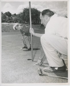 Billy Bruckner posing at a golf course