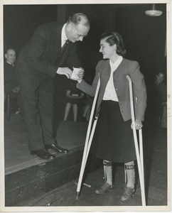 Dr. Deaver handing prize to client at Institute Day