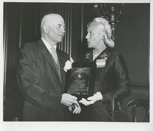 Margaret Milbank Bogert holds the 1956 President's Trophy with awardee Hugo Deffner