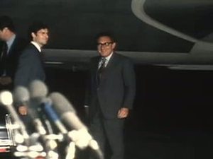 Kissinger returns from Paris