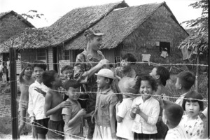 Francois Sully with village children at Cai Lay.