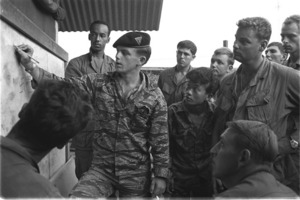 Lt. Kenneth M. Tolley briefing his squad leaders before a reconnaissance patrol in Tay Ninh Province.