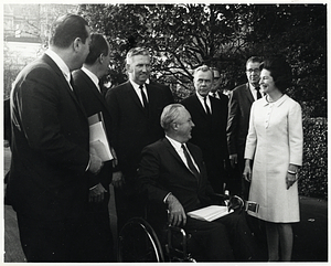 Mayor John F. Collins and First Lady Lady Bird Johnson with group of unidentified men at meeting of United States Conference of Mayors in Washington, D.C.