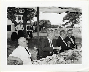 Mayor John F. Collins attending an outdoor luncheon