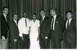 Mayor Raymond L. Flynn with unidentified woman and five men