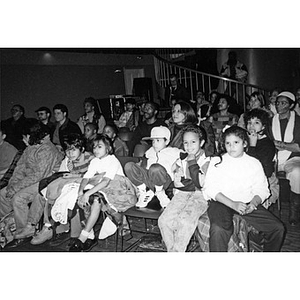 Children and adults in the audience at the Jorge Hernandez Cultural Center.