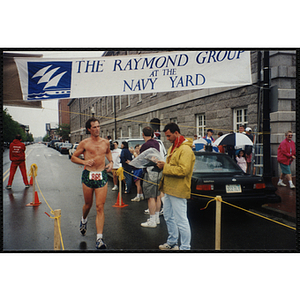 A man runs the Battle of Bunker Hill Road Race