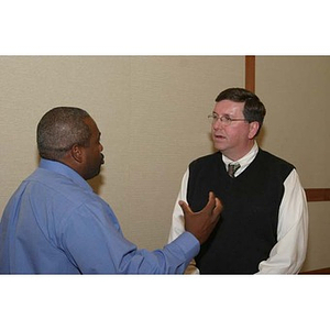 Reggie Plaisir and Dennis Shaughnessy converse at the Training Future Innovators Entrepreneurs Panel