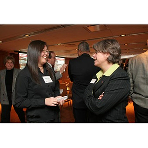 Qinrui Pang and Elizabeth Hill converse at a Torch Scholars event