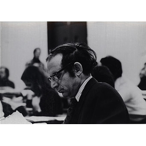 School of Law Professor Stephen Subrin examining papers