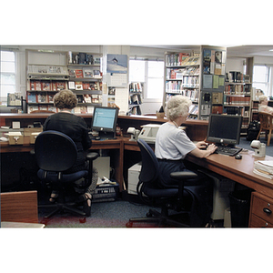 Burlington campus library staff manning the circulation desk
