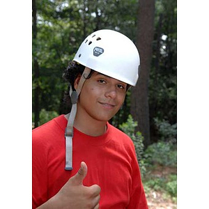 Danny Vazquez gives a thumbs-up during the Torch Scholars Project Adventure Ropes Course