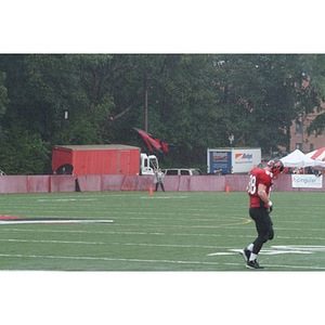 Northeastern football player at homecoming game against William & Mary