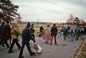 Demonstrators head toward the Pentagon