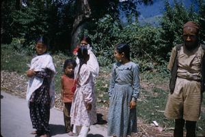 Young girls gather on the street