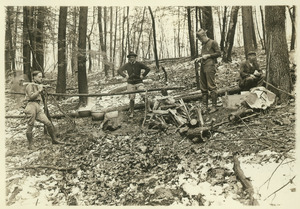 Sidney Waugh, George Chapman, A.K. Harrison and unidentified man from the Metawampe Club around a campfire