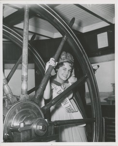 Georgette Lesch poses with ship's wheel