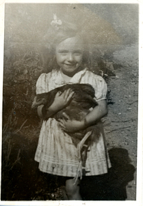 Carmen Ares holding a chicken