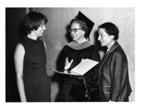 Graduate Patricia I. Brown (center) talks with attendees at the 1970 Suffolk University commencement