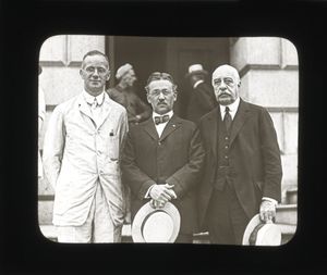 Trustee George Frost, J. Swift and Gleason L. Archer at the laying of the cornerstone ceremony for Suffolk University's Archer Building (20 Derne Street)