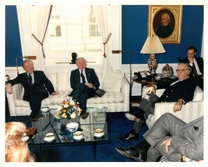 John Joseph Moakley, Irish Prime Minister Charles Haughey and others at a meeting during a visit to Washington, D.C., 3/16/1989