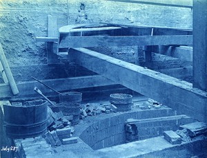 Pit, with buttresses and relieving arch just above 6th offset from top of tank;