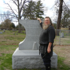 Ted Hinman with headstone