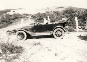 Joseph E. Wiley with his first automobile