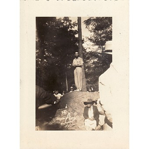 Reverend Wm. Frederick Fisher stands on a rock