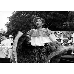 Young woman performing a folk dance at Festival Betances.