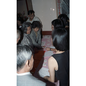 Guests waiting to get in to the Chinese Progressive Association's 20th Anniversary and the Workers' Center's 10th Anniversary Celebration