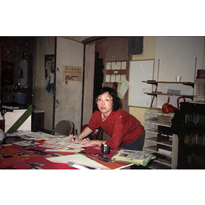 Woman preparing displays for the August Moon Festival