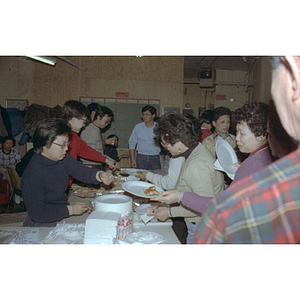 Guests and food at Chinese Progressive Association anniversary event