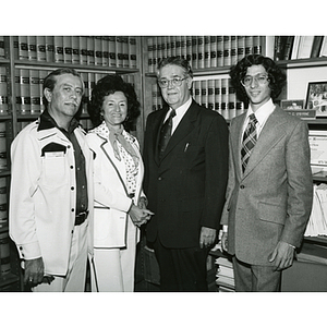 Four people pose together at the 1976 Law School commencement reception