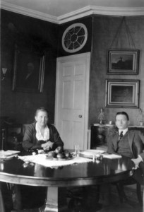 Portrait of Frances Greely Curtis and an unidentified man, sitting in the second floor dining room, facing front, Greely Stevenson Curtis House, 28-30 Mount Vernon St., Boston, Mass., February 18, 1923