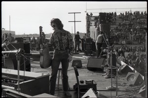 Hollywood Speedway Rock Festival: unidentified acoustic guitarist on stage, possibly with Wet Willie