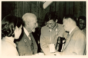 W. E. B. Du Bois speaking with Mao Dun and other unidentified Chinese delegates at Afro-Asian Writers Conference, Tashkent
